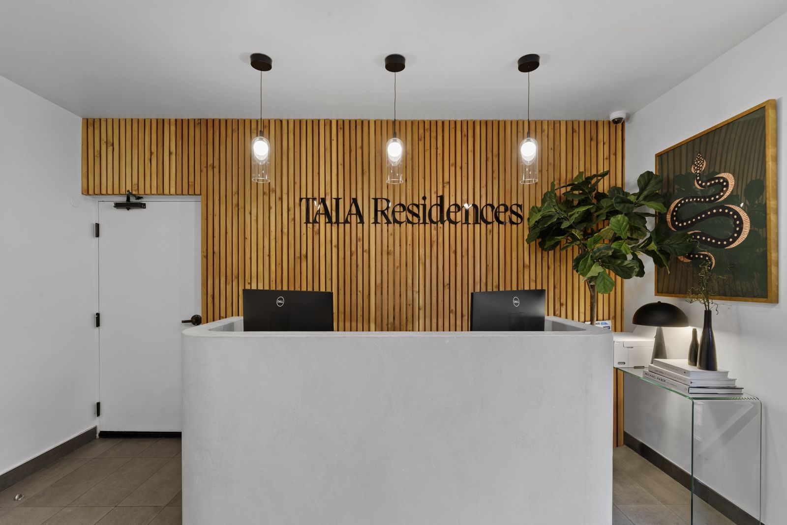 The front desk in a Tala residence lobby